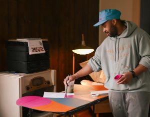 man painting at Sou'wester artist residency